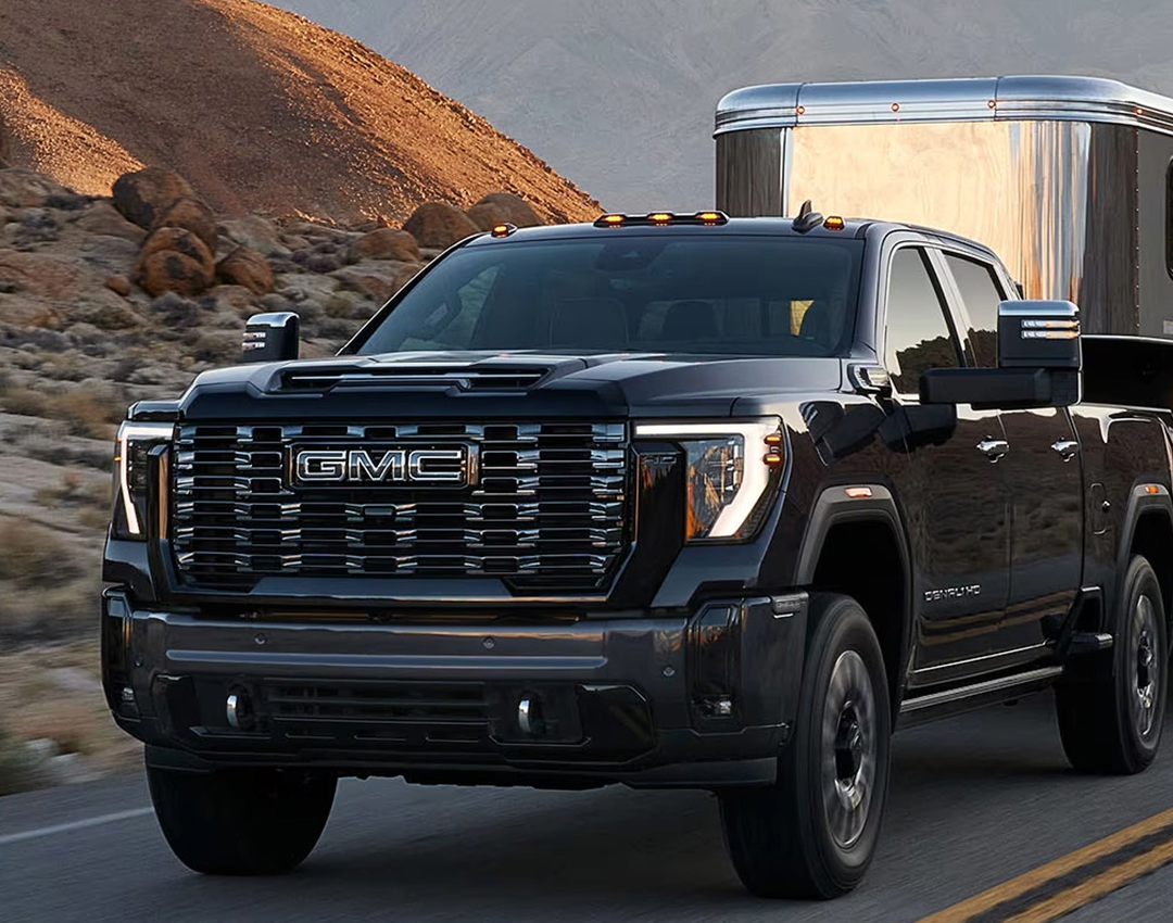 2025 GMC Sierra HD towing a trailer