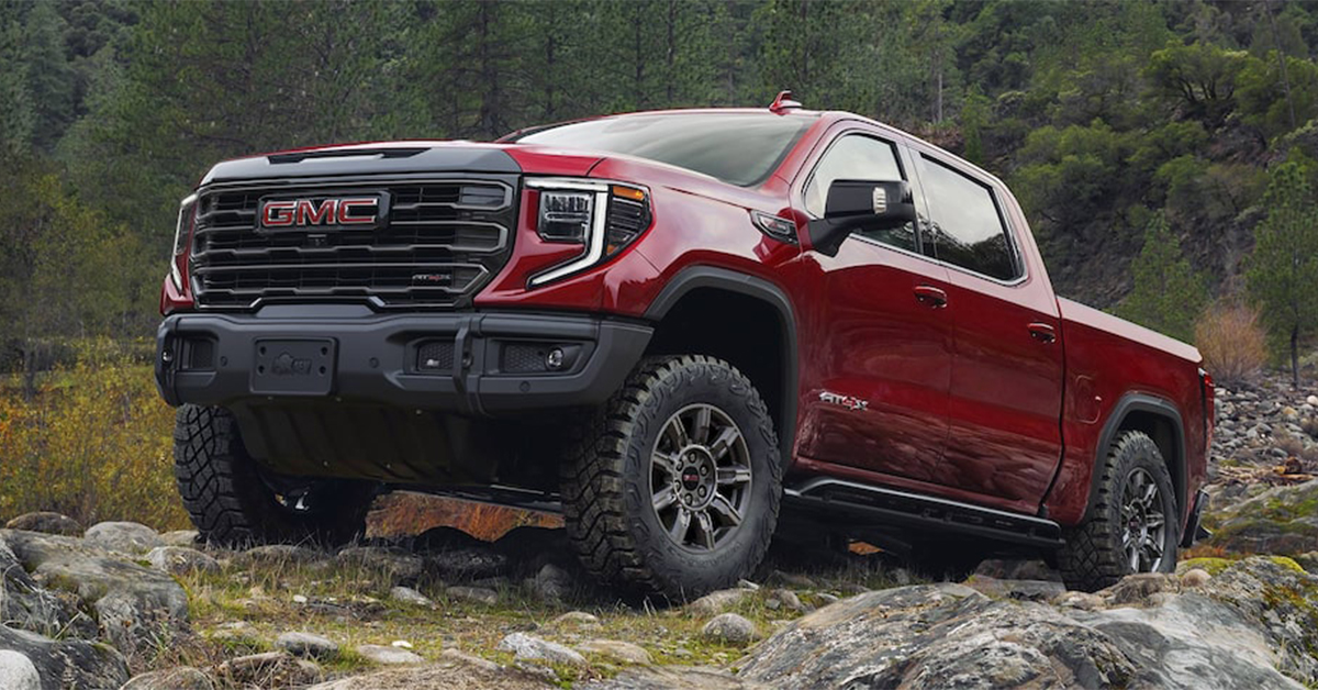 2025 GMC Sierra 1500 AT4x climbing over rocks