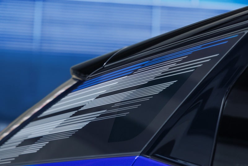 Close-up of the Modern Pattern on the 2026 OPTIQ-V Rear Quarter Glass | Huston GMC in LAKE WALES FL